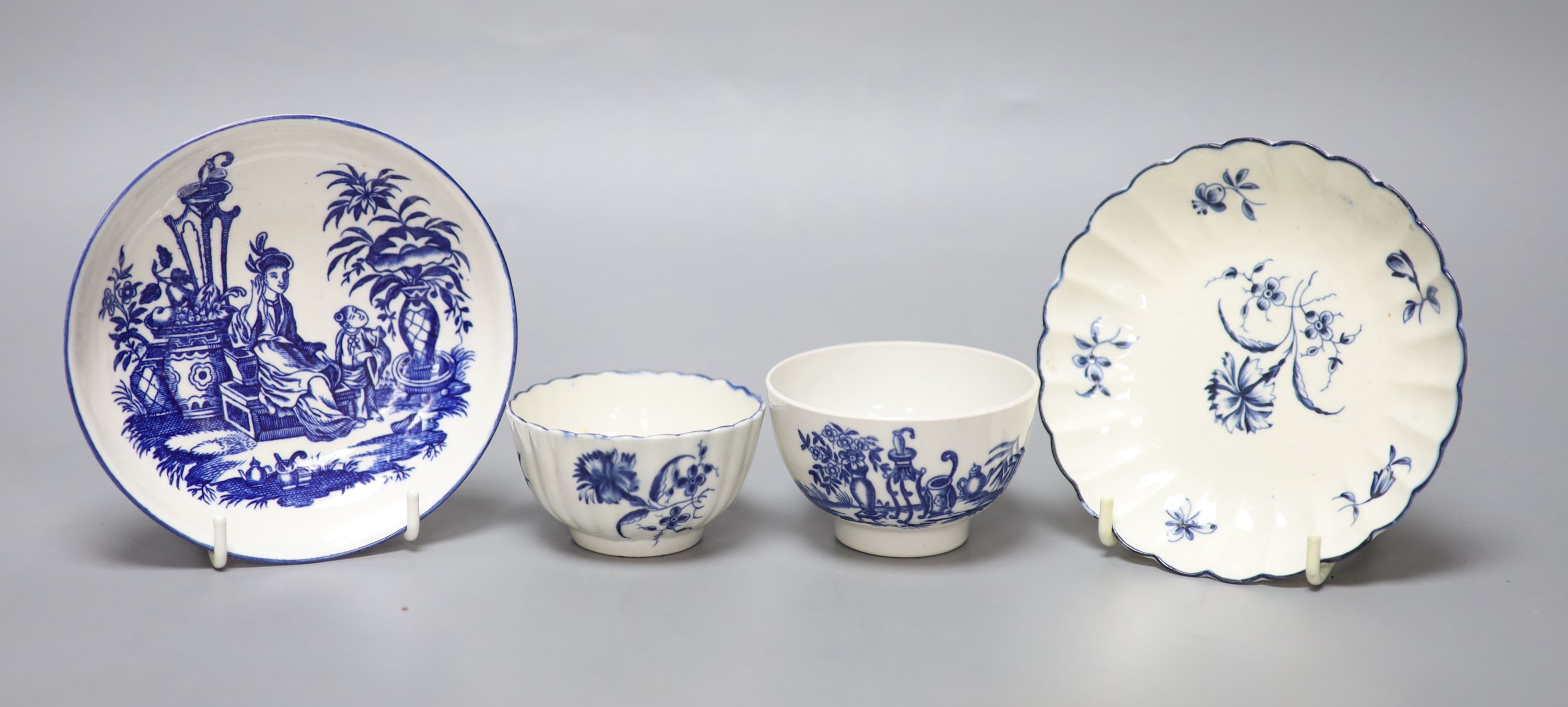 An 18th century Worcester teabowl and saucer Gilliflower pattern and another with mother and child pattern, all with crescent marks